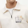 Bluza polo z kwiatowym logo i zamkiem 1/4