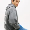 Bluza z kapturem Tommy Jeans z logo wykonanym techniką sprayu Bluza z kapturem Tommy Jeans z logo wykonanym techniką sprayu