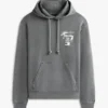 Bluza z kapturem Tommy Jeans z logo wykonanym techniką sprayu Bluza z kapturem Tommy Jeans z logo wykonanym techniką sprayu