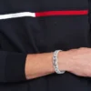 Bransoletka ze stali nierdzewnej z paskiem w flagi