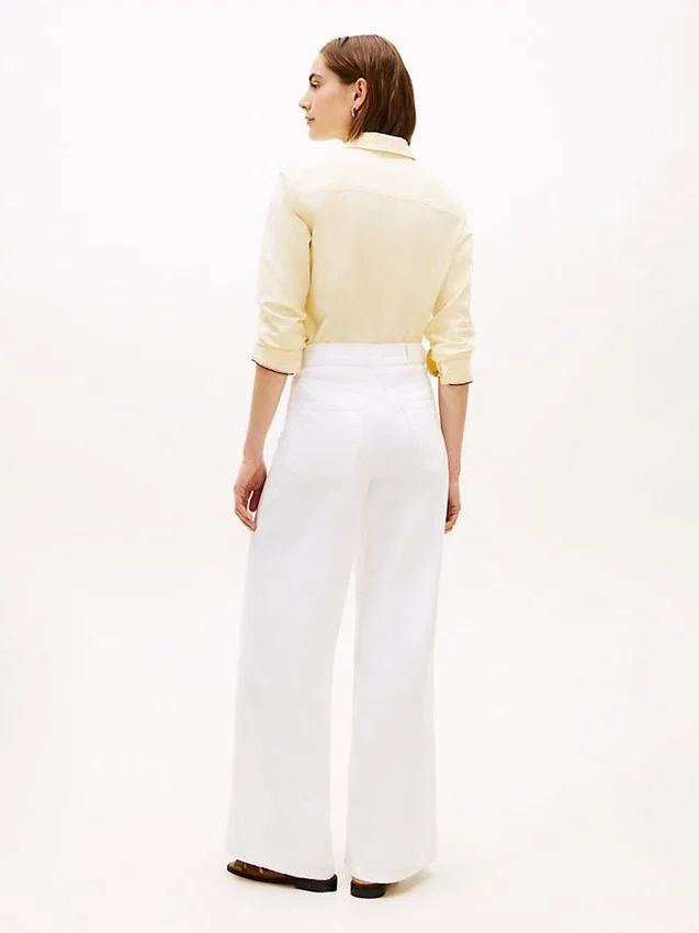 Dżinsy z wysokim stanem i szerokimi nogawkami z surowym wykończeniem Dżinsy z wysokim stanem i szerokimi nogawkami z surowym wykończeniem