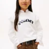 Dzianinowy sweter z cekinami i falbanami Dzianinowy sweter z cekinami i falbanami