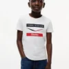 Dziecięca koszulka Tommy x Cadillac F1® Team Chevron Dziecięca koszulka Tommy x Cadillac F1® Team Chevron