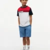 Dziecięca koszulka w paski z flagami w stylu colorblock Dziecięca koszulka w paski z flagami w stylu colorblock