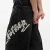 Dziecięce jeansy Hilfiger z nadrukiem graffiti