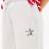 Dziecięce spodnie dresowe z logo w kształcie gwiazdy z kryształkami Dziecięce spodnie dresowe z logo w kształcie gwiazdy z kryształkami