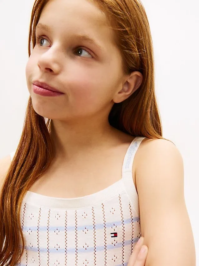 Dziecięcy sweter bez rękawów w paski z dzianiny pointelle Dziecięcy sweter bez rękawów w paski z dzianiny pointelle