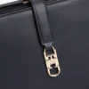 Elegancka torebka na ramię z monogramem
