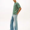 Jeansy Tommy Jeans z efektem postarzenia i rozszerzanymi nogawkami