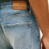 Jeansy Tommy Jeans z efektem postarzenia i rozszerzanymi nogawkami