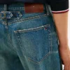 Jeansy z klamrą o luźnym kroju Jeansy z klamrą o luźnym kroju