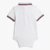 Kombinezon polo Tommy Wicking dla niemowląt Kombinezon polo Tommy Wicking dla niemowląt