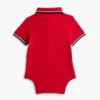Kombinezon polo Tommy Wicking dla niemowląt Kombinezon polo Tommy Wicking dla niemowląt