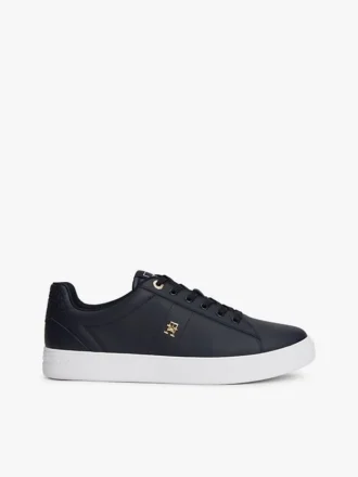 Skórzane trampki z monogramem na obcasie