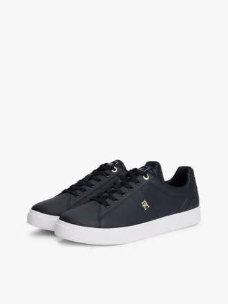 Skórzane trampki z monogramem na obcasie