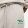 Spodnie dresowe z frotte z logo w stylu relaxed