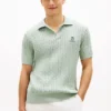 Sweter polo z krótkim rękawem i splotem warkoczowym Sweter polo z krótkim rękawem i splotem warkoczowym