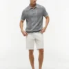 Sweter polo z krótkim rękawem i splotem warkoczowym Sweter polo z krótkim rękawem i splotem warkoczowym