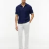 Sweter polo z krótkim rękawem i splotem warkoczowym Sweter polo z krótkim rękawem i splotem warkoczowym