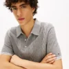 Sweter polo z krótkim rękawem i splotem warkoczowym Sweter polo z krótkim rękawem i splotem warkoczowym