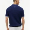 Sweter polo z krótkim rękawem i splotem warkoczowym Sweter polo z krótkim rękawem i splotem warkoczowym