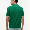 Sweter polo z krótkim rękawem i splotem warkoczowym Sweter polo z krótkim rękawem i splotem warkoczowym