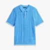Sweter polo z krótkim rękawem i splotem warkoczowym Sweter polo z krótkim rękawem i splotem warkoczowym
