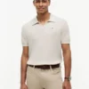 Sweter polo z krótkim rękawem i wykończeniem Sweter polo z krótkim rękawem i wykończeniem