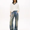 Sweter Tommy Jeans o luźnym kroju z dekoltem w serek Sweter Tommy Jeans o luźnym kroju z dekoltem w serek