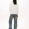 Sweter Tommy Jeans o luźnym kroju z dekoltem w serek Sweter Tommy Jeans o luźnym kroju z dekoltem w serek
