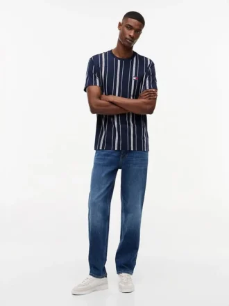 Tommy Jeans – jeansy o prostym kroju z zwężanymi nogawkami Tommy Jeans – jeansy o prostym kroju z zwężanymi nogawkami