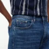 Tommy Jeans – jeansy o prostym kroju z zwężanymi nogawkami Tommy Jeans – jeansy o prostym kroju z zwężanymi nogawkami